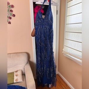 Website not letting me return size 6 bedazzled royal blue dress.
